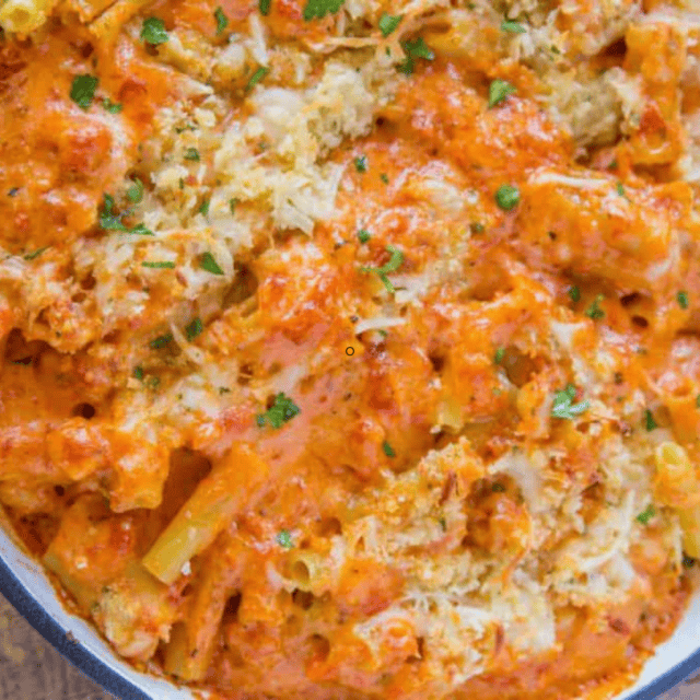 creamy cheesy pasta in a purple dish