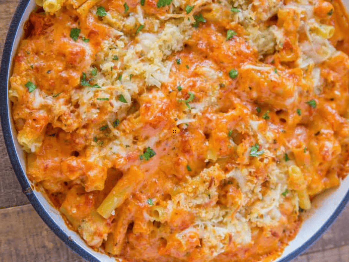 creamy cheesy pasta in a purple dish 