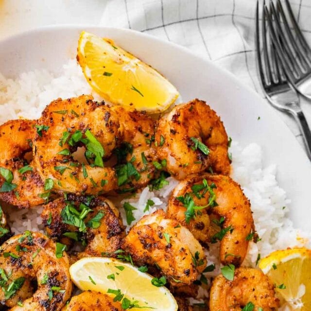 Plated shrimp with lemon and parsley