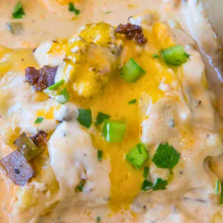 Finished lasagna roll up with creamy cheese topping