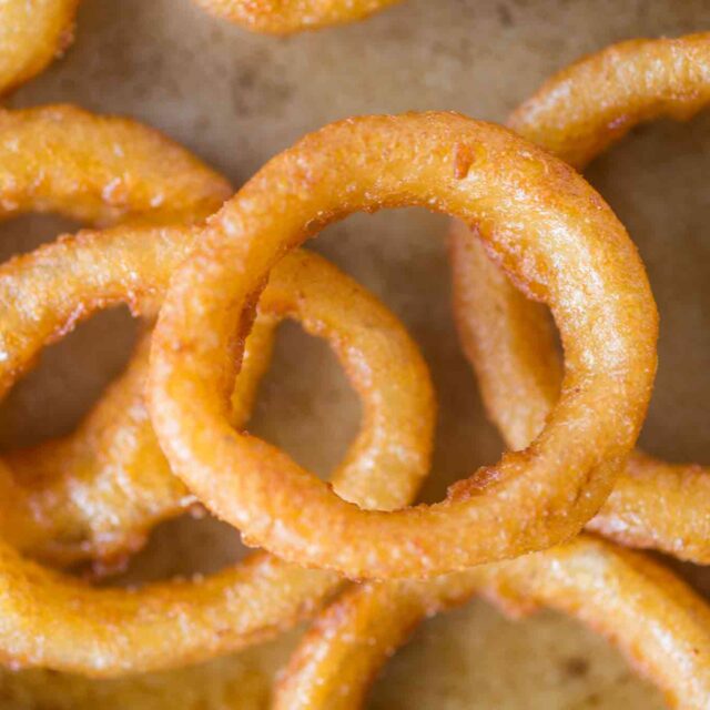 fried battered onions in pan