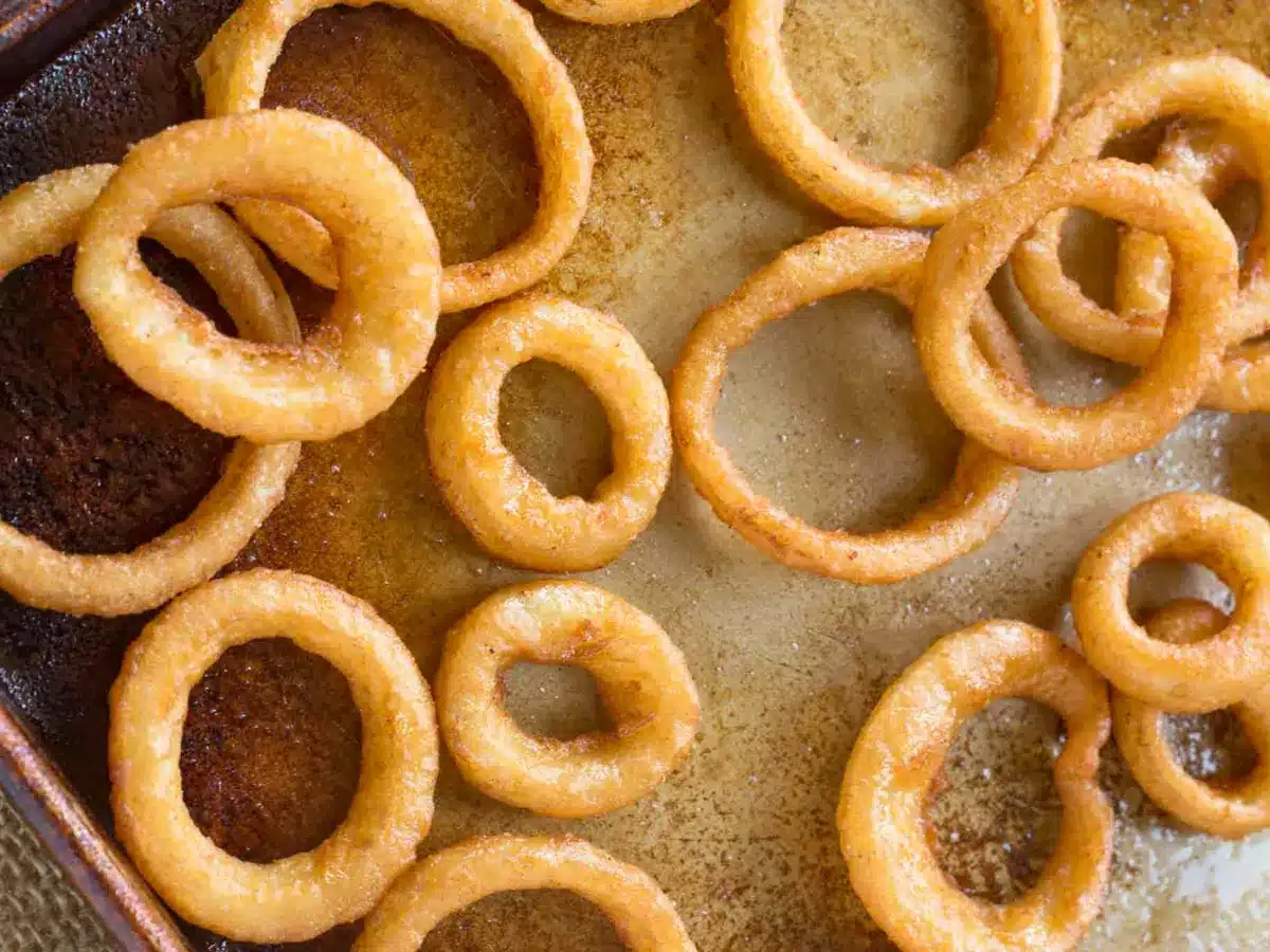 Fried Onion rings on baking sheet