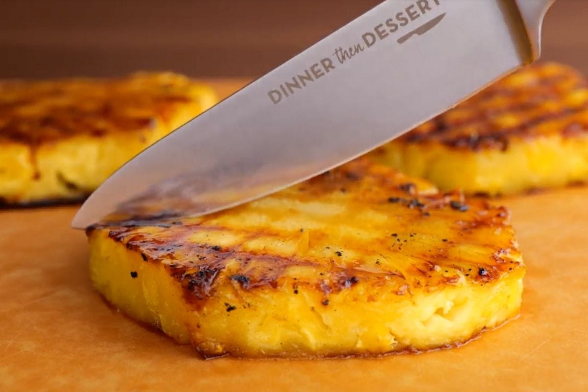 Brown Sugar Grilled Pineapple on cutting board with knife