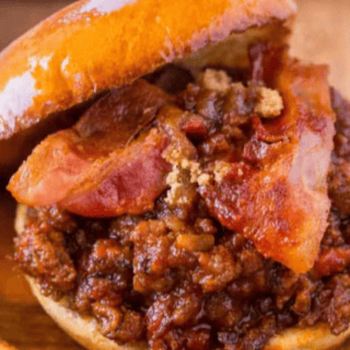 sandwich open faced showing bacon and beef