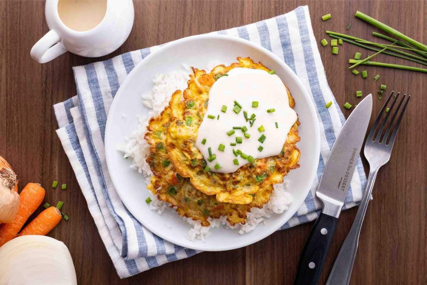 Egg Foo Young with gravy on plate