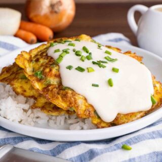 Egg Foo Young with gravy on plate