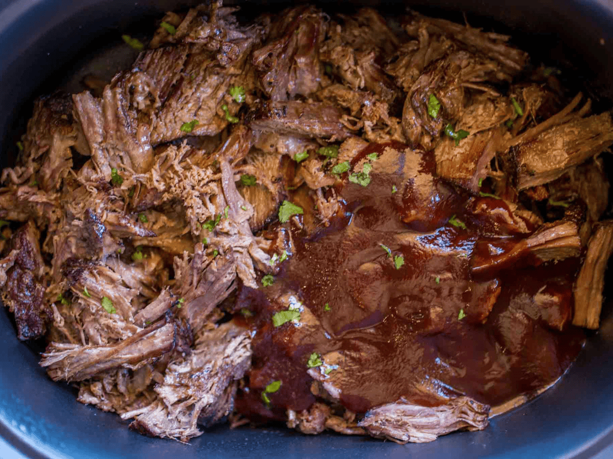 Beef with BBQ sauce in a slow cooker