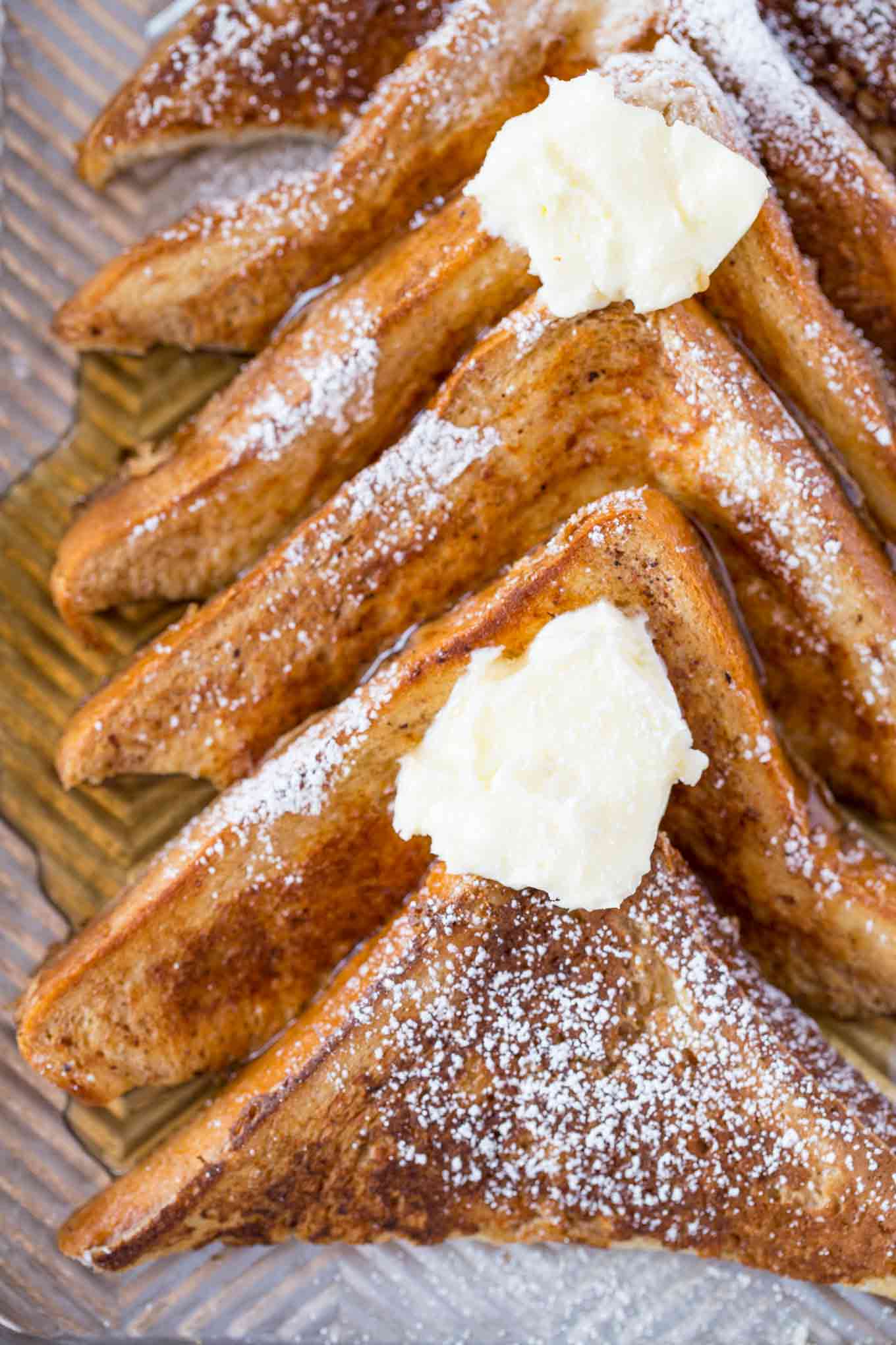 Easy French Toast on baking sheet with maple syrup