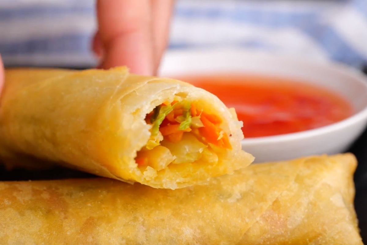 Spring Rolls and dipping sauce with bite taken