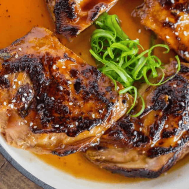 several thighs in cast iton with scallions