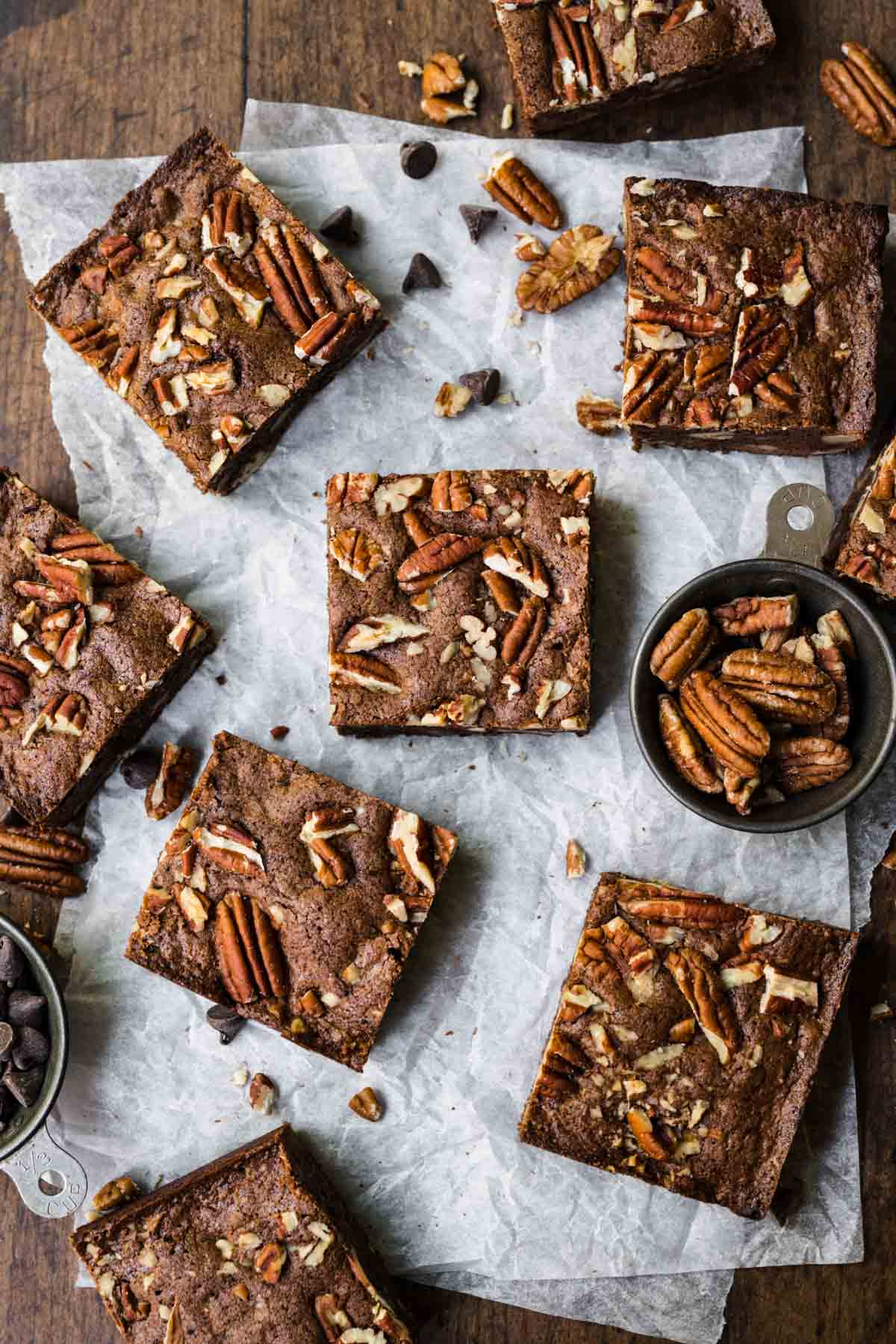 Pecan Brownies squares on parchment