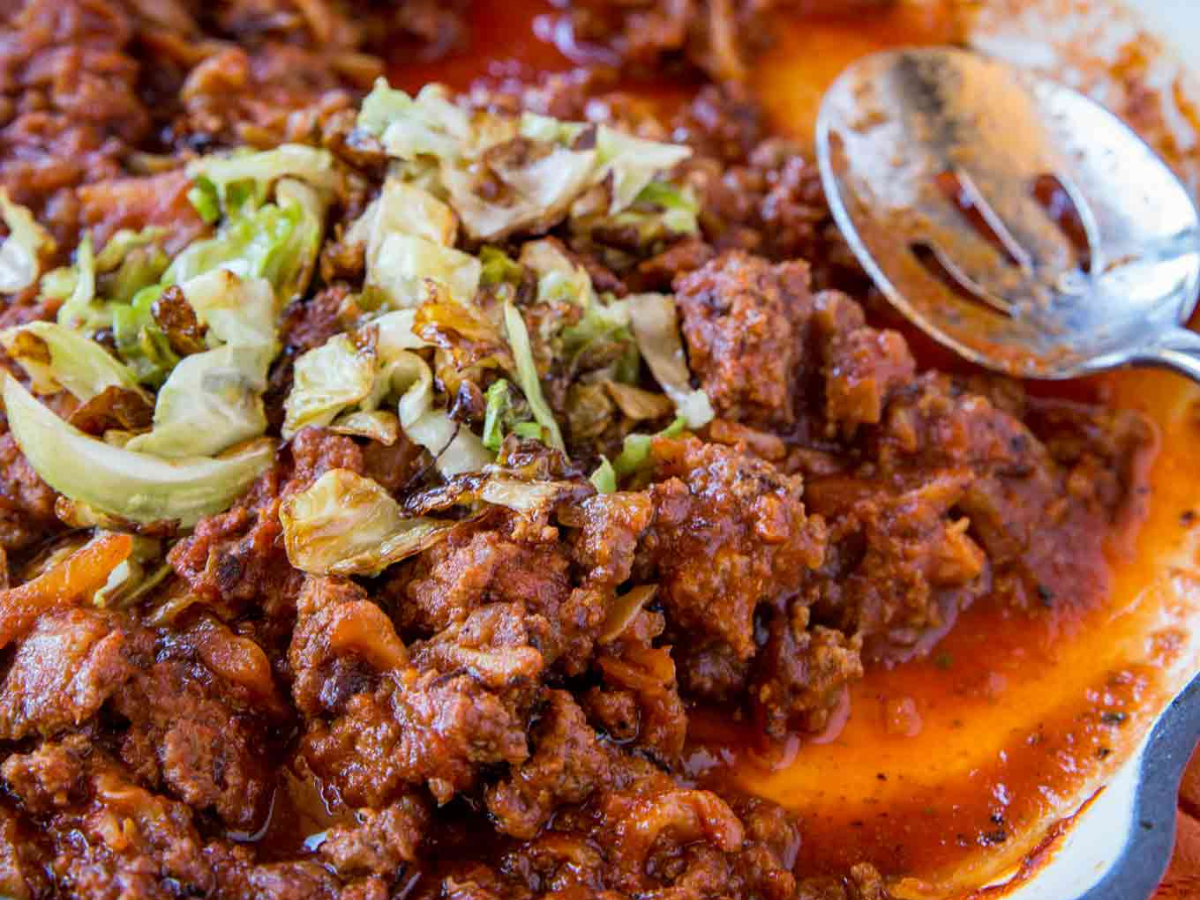 Pot of Sloppy Joe with Cabbage with silver spoon