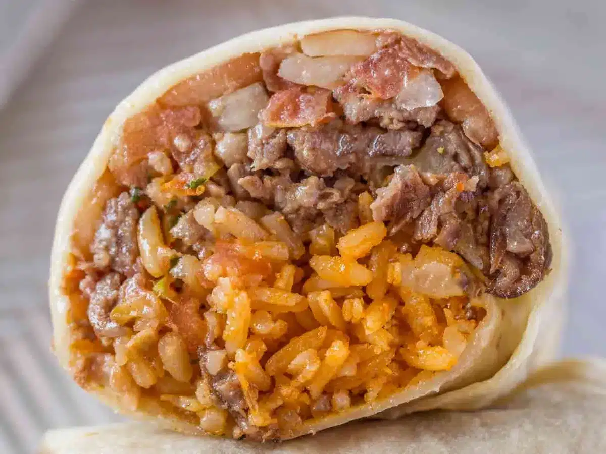 Closeup of ingredients wrapped in a tortilla