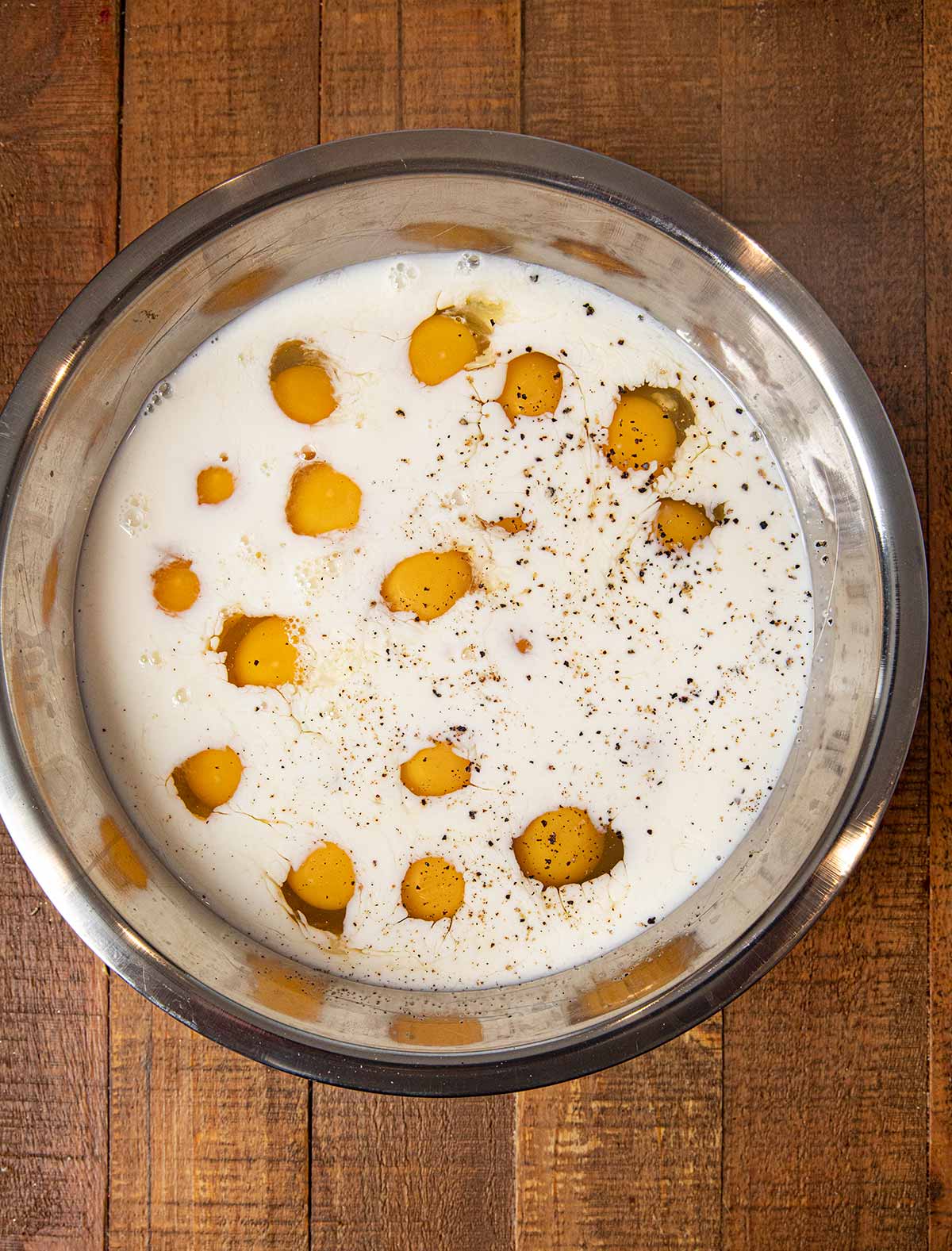 Oven Scrambled Eggs ingredients in mixing bowl