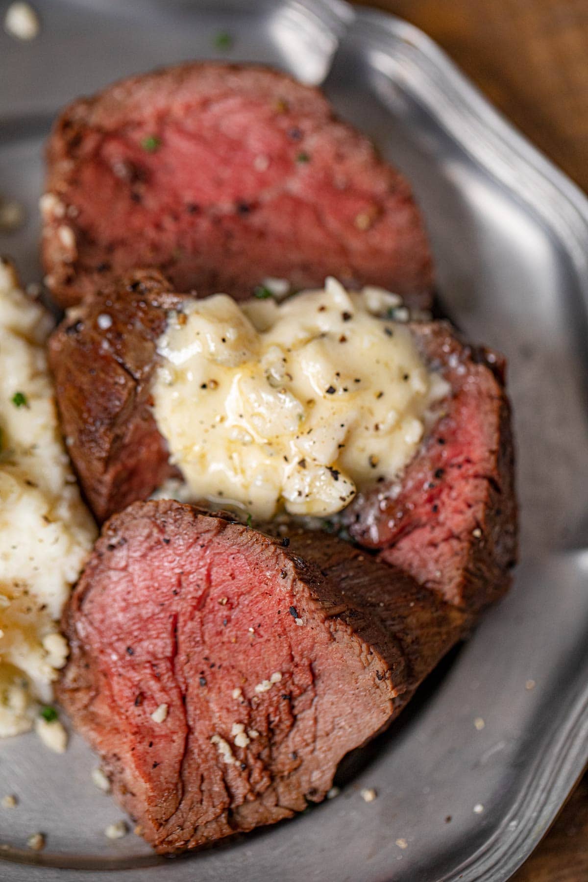 Beef Tenderloin on plate with Blue Cheese Butter