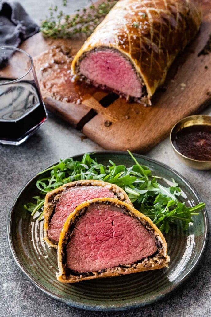 Beef Wellington sliced on a plate