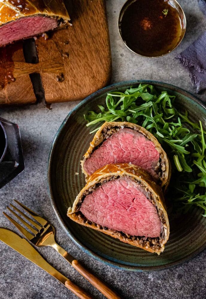 Beef Wellington sliced on a plate