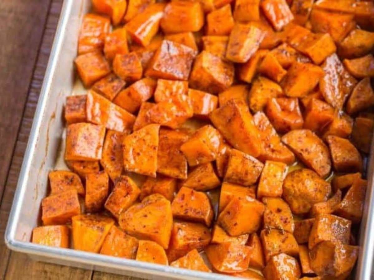 diced sweet potatoes in a roasting pan