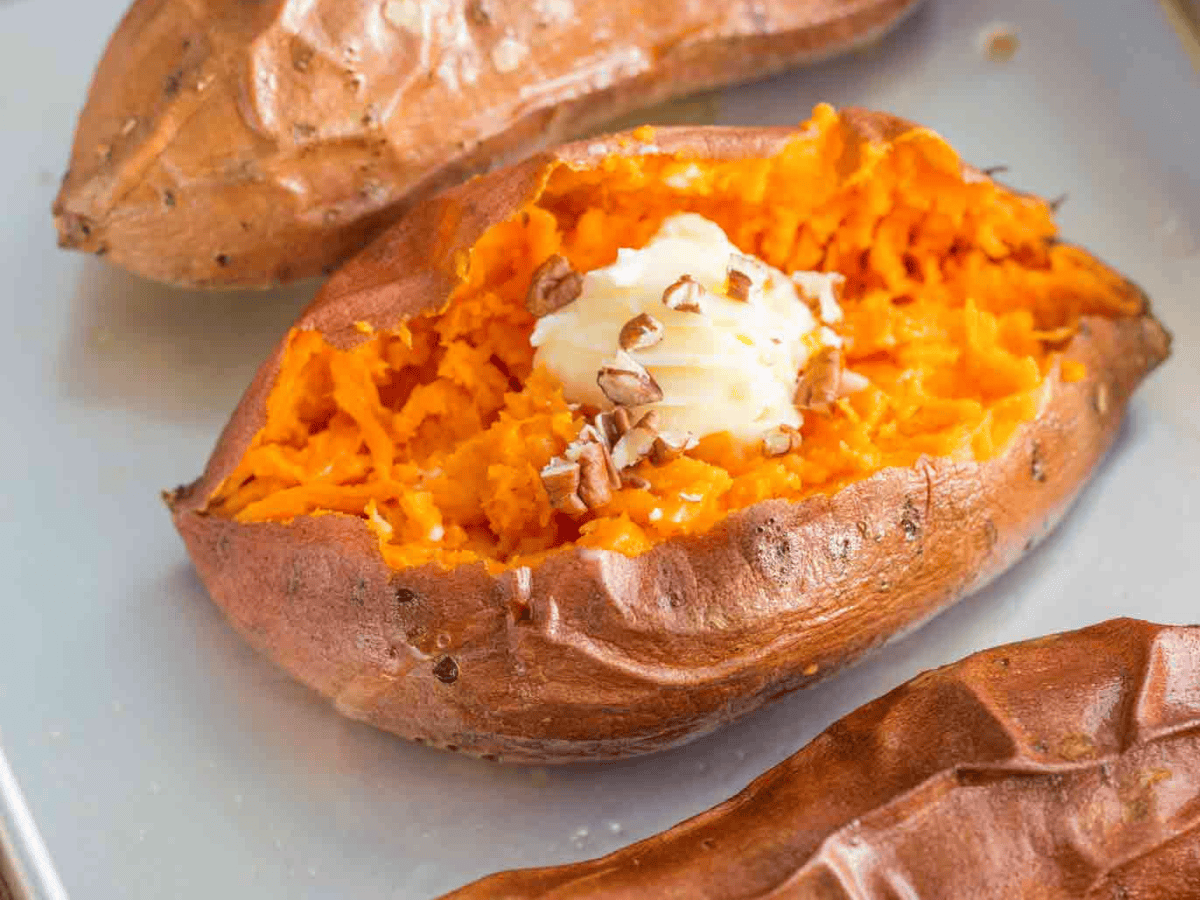 potato with butter and nuts on top