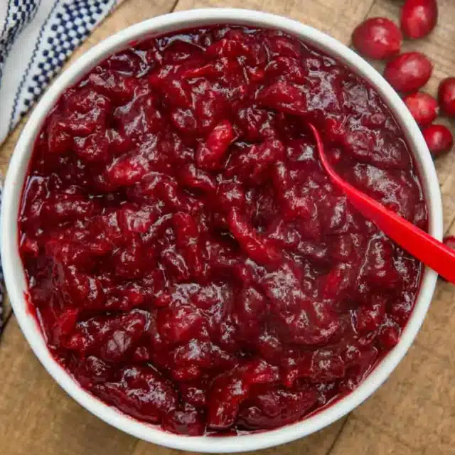 Fruit made into a sauce and served in a bowl