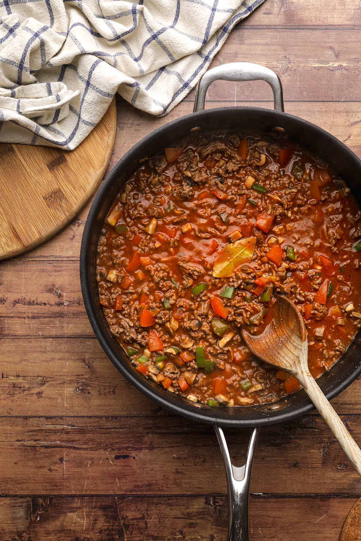 Swiss Steak Noodles ingredients in cooking pan