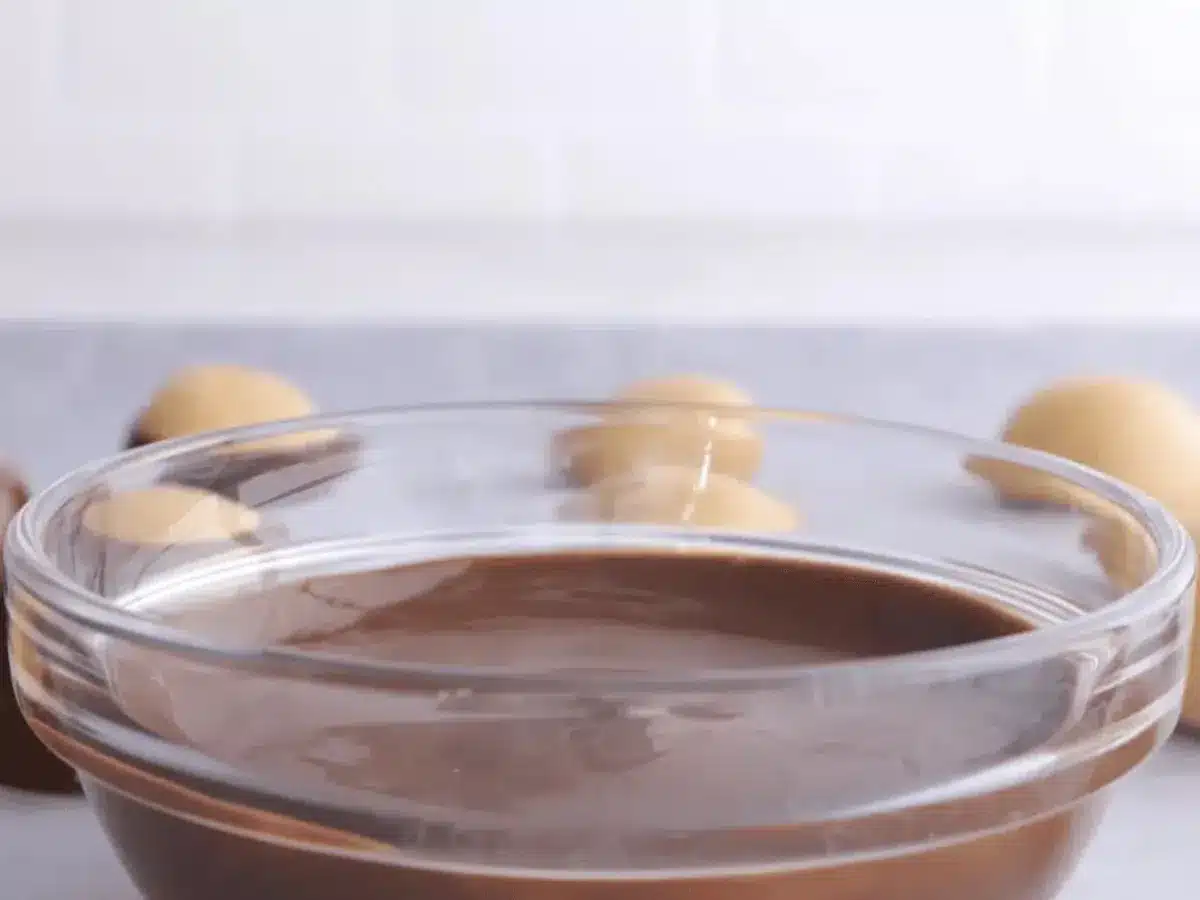 Bowl of melting chocolate for dipping