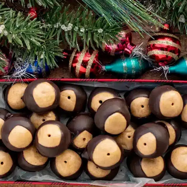 Balls in box for gifting with tree and ornaments