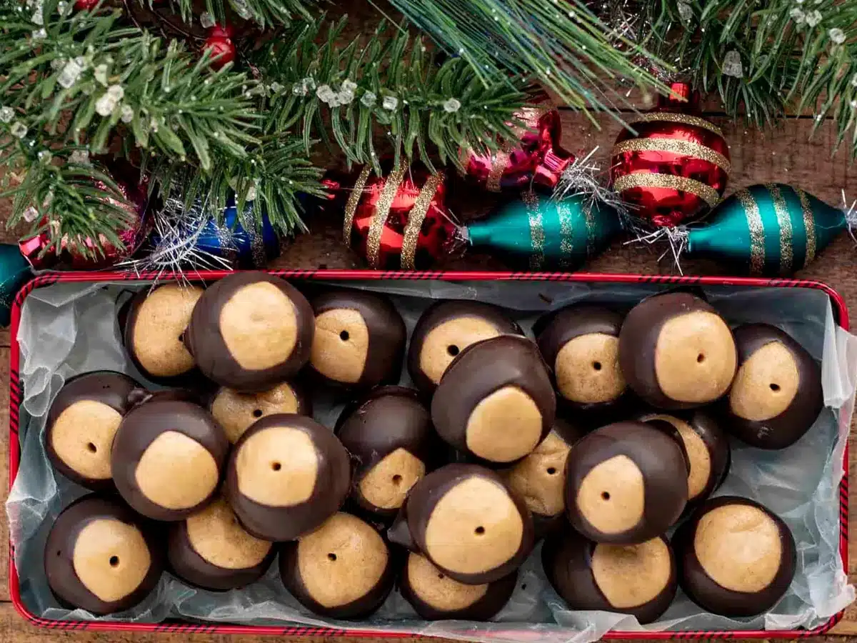 Balls in box for gifting with tree and ornaments
