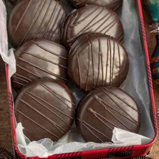 tray of cookies covered in chocolate