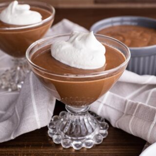 Chocolate Pudding in dessert dish with whipped cream