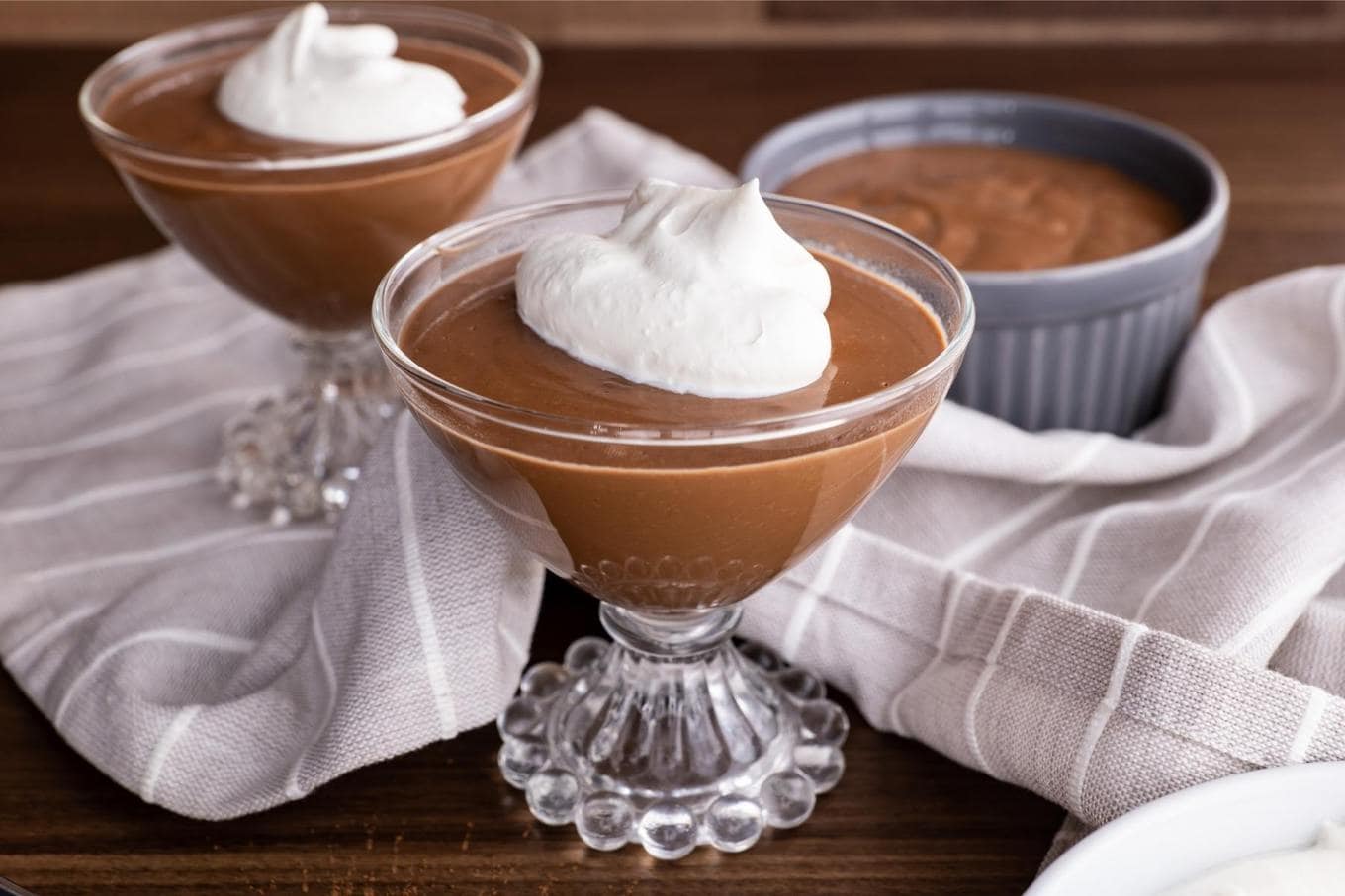 Chocolate Pudding in dessert dish with whipped cream