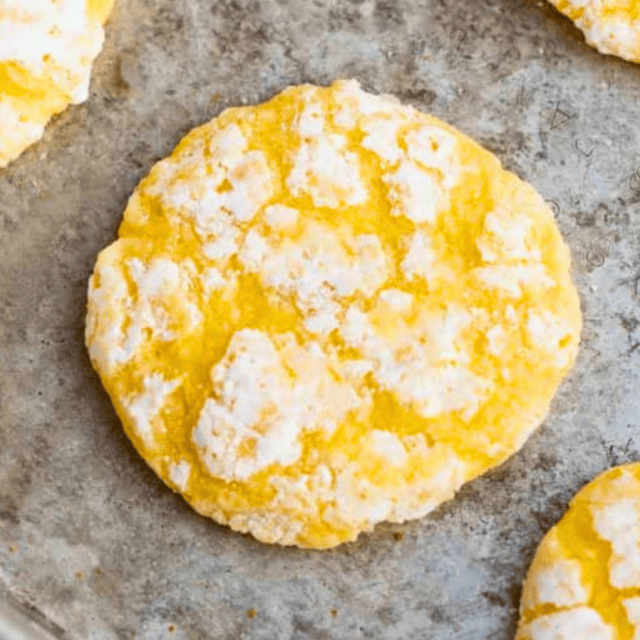 Yellow cookie with powdered sugar