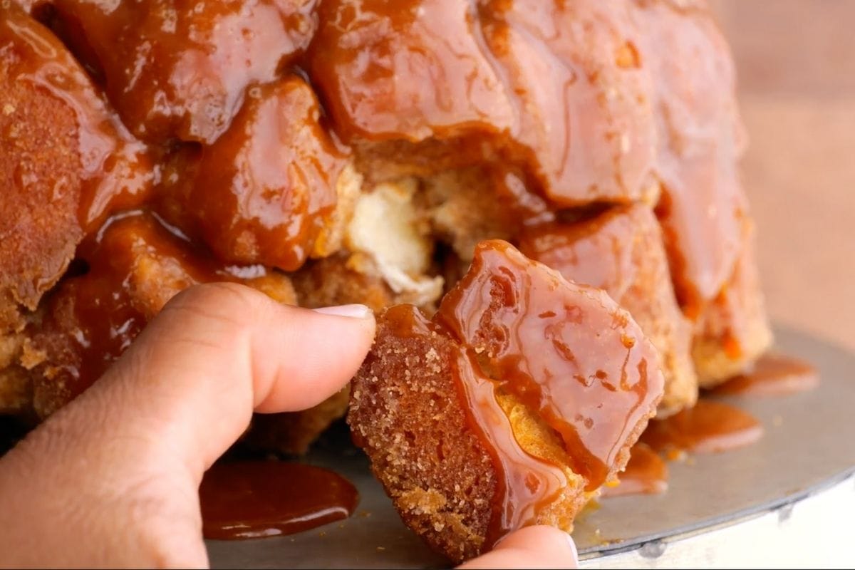 Monkey Bread on cake stand being pulled apart