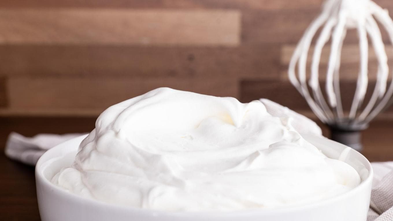 Whipped Cream in bowl with whisk mix attachment