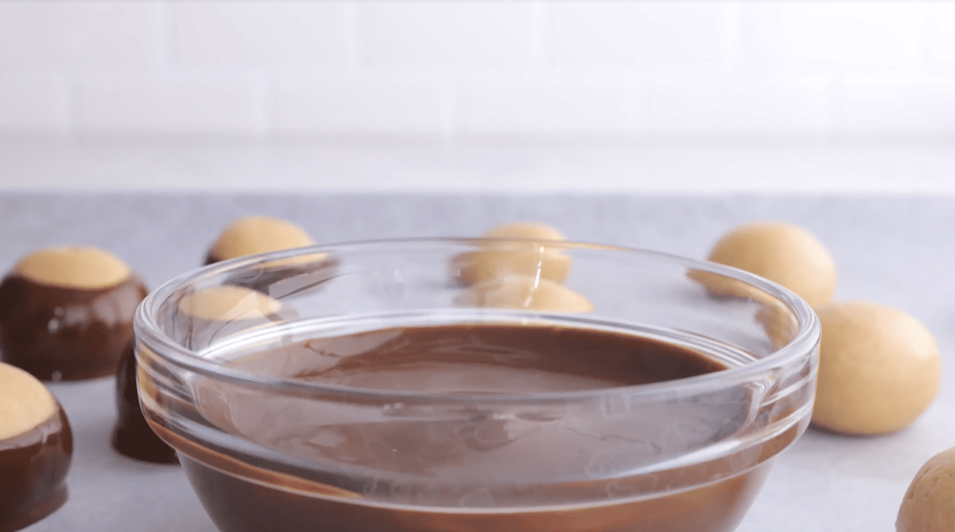 glass bowl of melted chocolate