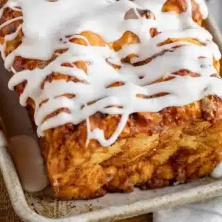 Bread in pan with frosting on top