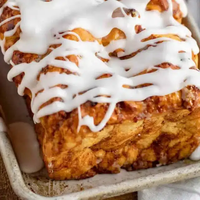 Bread in pan with frosting on top