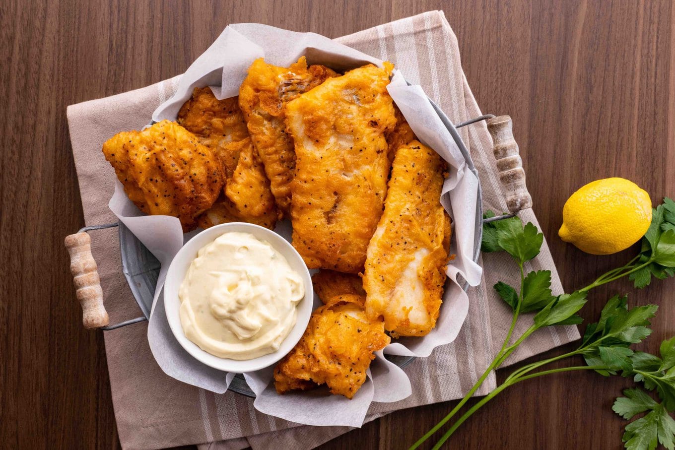 Beer Battered Fish in basket with tartar sauce