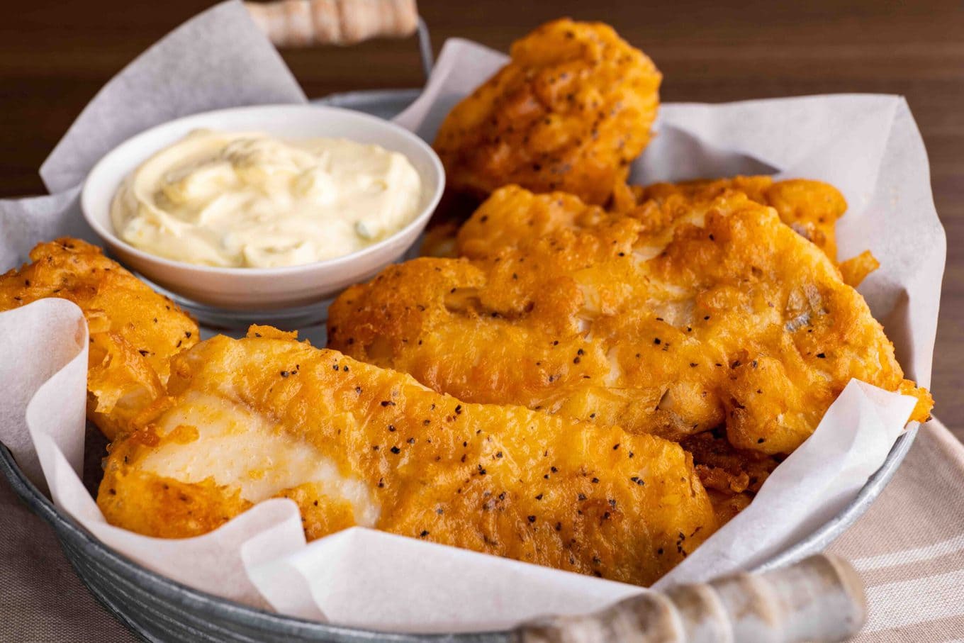 Beer Battered Fish in basket with tartar sauce