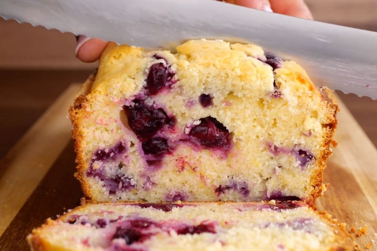 Blueberry Lemon Bread sliced on cutting board