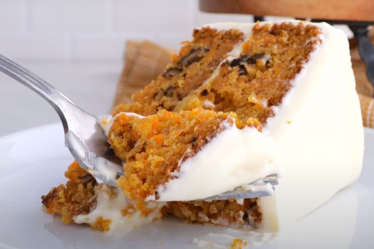 Classic Carrot Cake slice on plate with fork