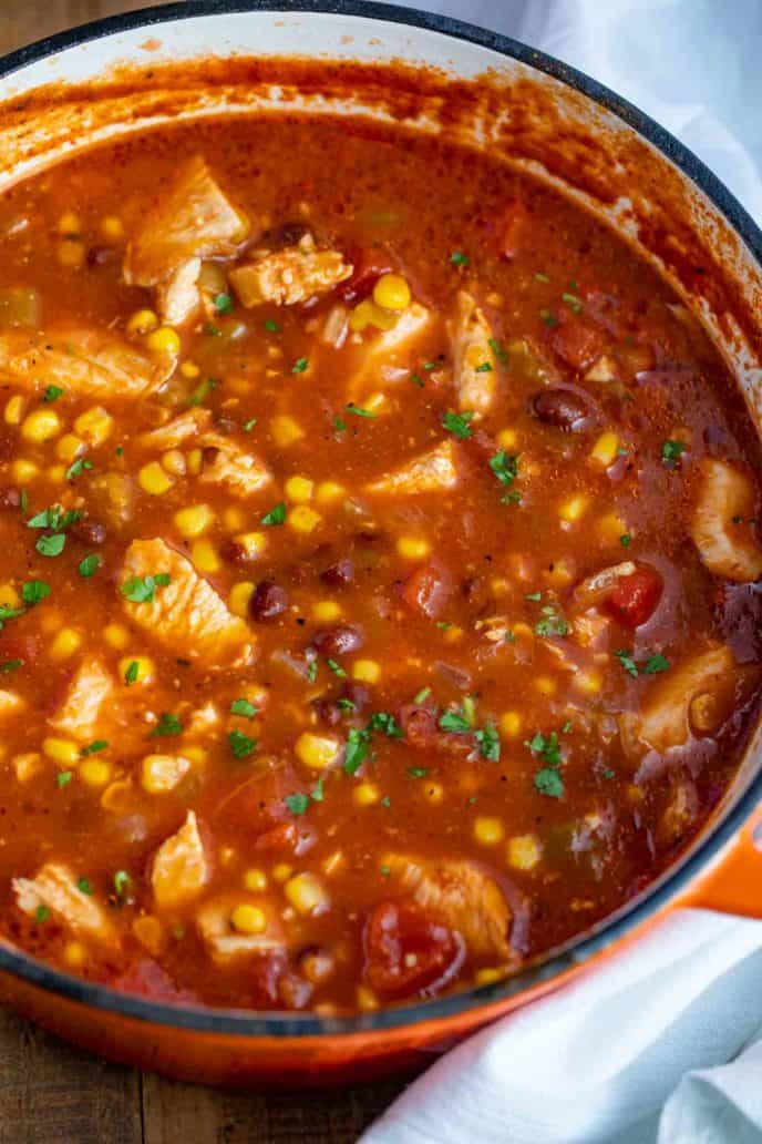 close up of soup in a dutch oven 