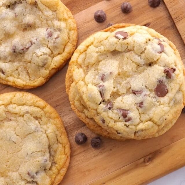 Chocolate Chip Cookies on board with chocolate chips