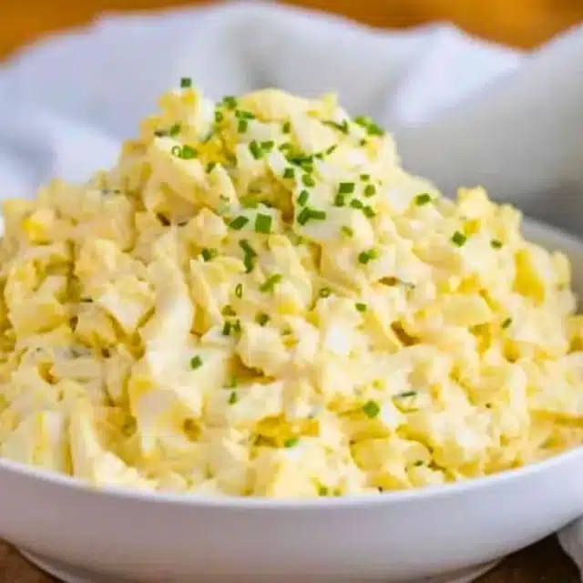 Egg Mixture in bowl with greens on top
