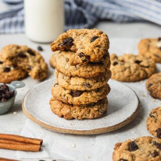 Oatmeal Raisin Cookies in a stack with bite taken