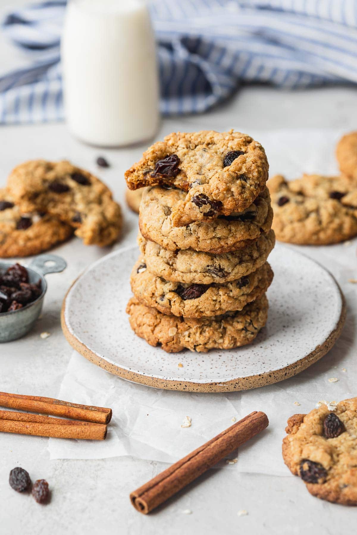 Oatmeal Raisin Cookies in a stack with bite taken