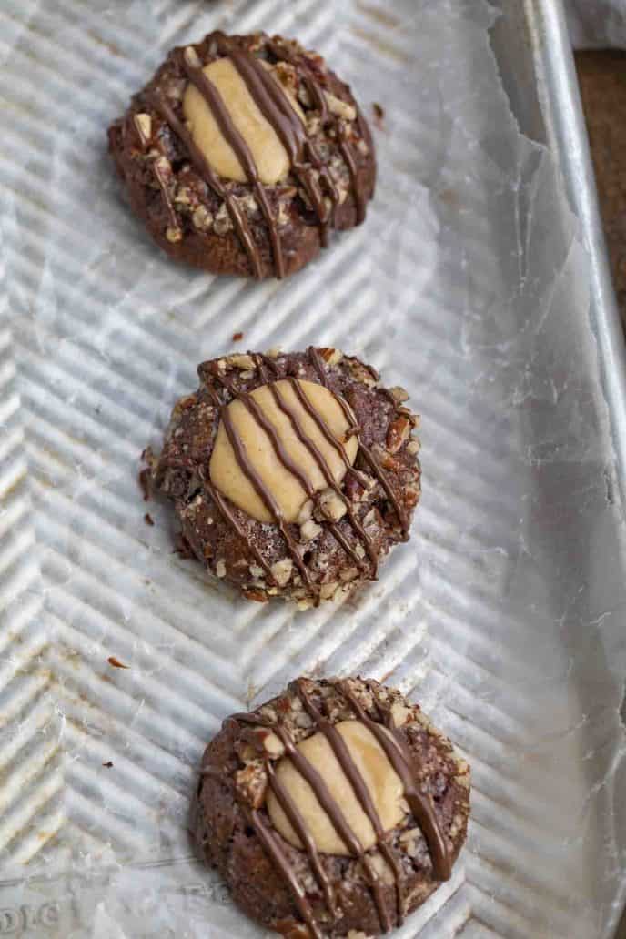 Turtle Cookies on baking sheet with parchment