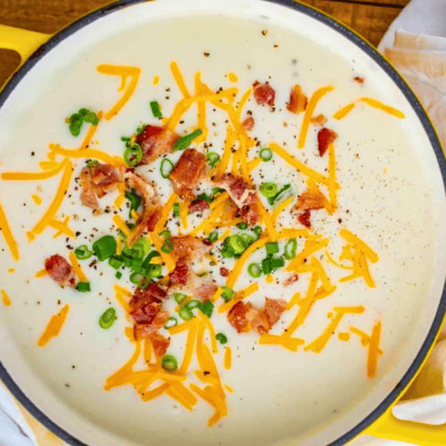 Pot with soup and toppings