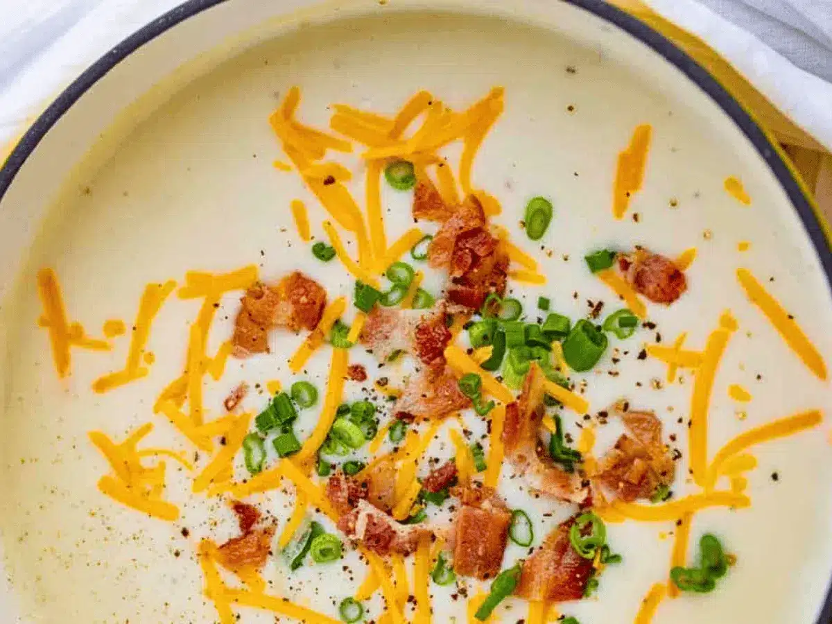 soup being served in a bowl 