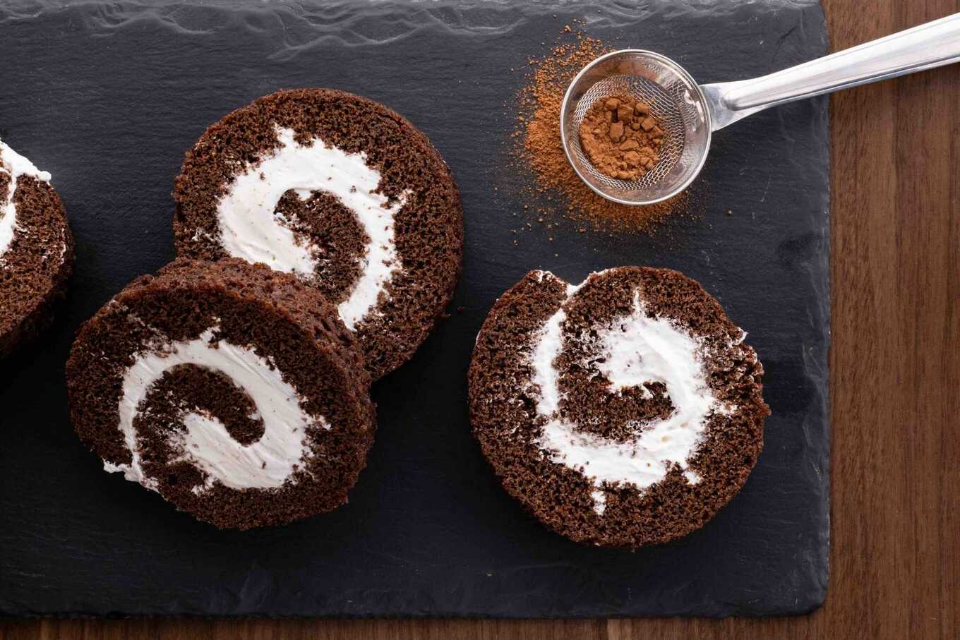 Chocolate Cake Roll (Swiss Roll) slices on serving plate